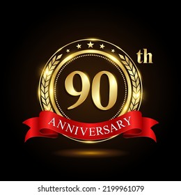 90th golden anniversary logo, with shiny ring and red ribbon, isolated on black background, vector design