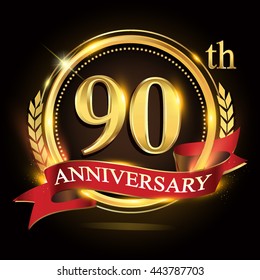 90th golden anniversary logo, with shiny ring and red ribbon, laurel wreath isolated on black background, vector design