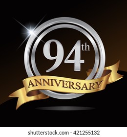 94th anniversary logo, with shiny silver ring and gold ribbon isolated on black background. vector design for birthday celebration.