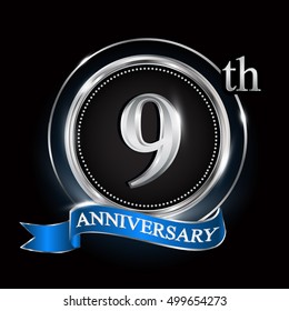 9th anniversary logo with silver ring and blue ribbon.