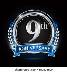 9th Silver Anniversary Logo With Blue Ribbon And Ring.