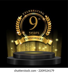9th years golden anniversary logo celebration with ring ribbon and 3d podium. isolated on black background