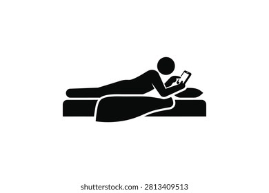 ['A simple black icon depicting a person lying prone on a bed while holding and looking at a mobile phone device']