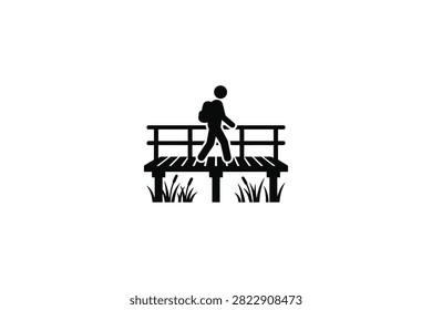 ['A simple black icon depicting a person with a backpack walking across a wooden bridge or boardwalk surrounded by grass']