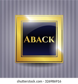 Aback gold emblem or badge