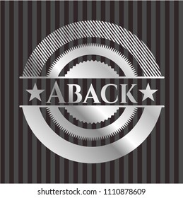 Aback silver badge or emblem
