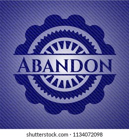 Abandon emblem with jean background