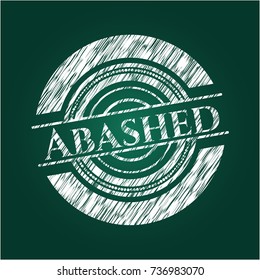 Abashed chalkboard emblem on black board