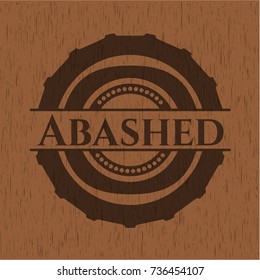 Abashed wooden emblem