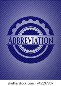 Abbreviation badge with denim background