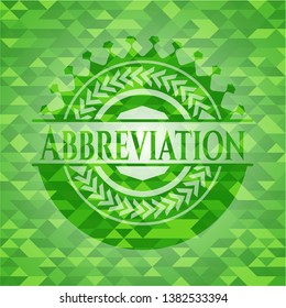Abbreviation green emblem with triangle mosaic background. Vector Illustration. Detailed.