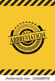 Abbreviation grunge black emblem with yellow background, warning sign. Vector Illustration. Detailed.