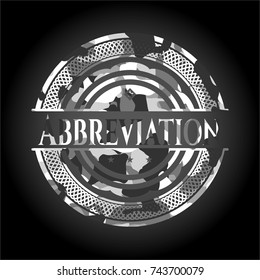 Abbreviation on grey camo pattern