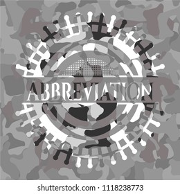 Abbreviation on grey camo texture