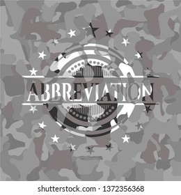 Abbreviation on grey camo texture