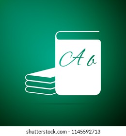 ABC book icon isolated on green background. Dictionary book sign. Alphabet book icon. Flat design. Vector Illustration