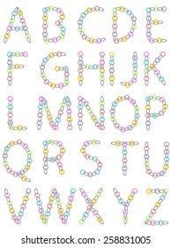 Abc from colored and metallic chain on white