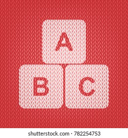 ABC cube sign illustration. Vector. Knitted white icon on a red knitted background.
