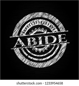 Abide written on a blackboard