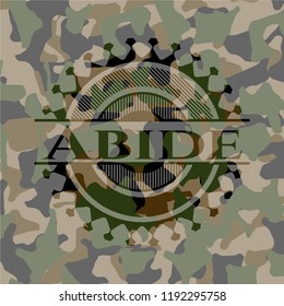 Abide written on a camo texture