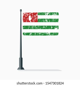Abkhazian flag with scratches, vector flag of Abkhazia on flagpole with shadow.