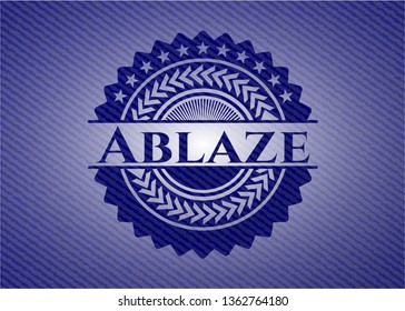 Ablaze badge with denim background