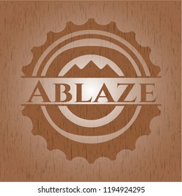 Ablaze badge with wooden background