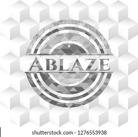 Ablaze grey badge with geometric cube white background