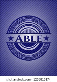 Able emblem with denim high quality background