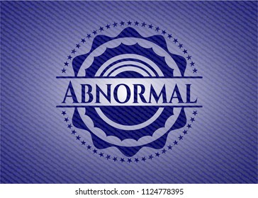 Abnormal badge with denim background