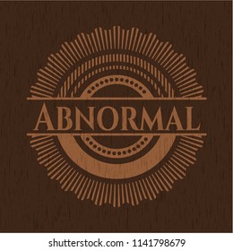 Abnormal badge with wooden background
