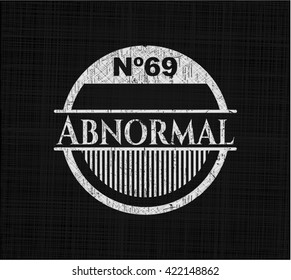 Abnormal chalk emblem written on a blackboard