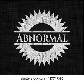 Abnormal chalkboard emblem written on a blackboard