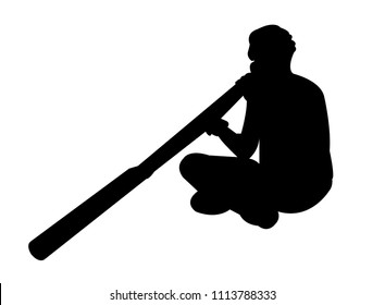 Aboriginal Man Playing A Didgeridoo