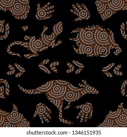 Aboriginal seamless vector pattern including ethnic Australian motive with Australia territory, kangaroo, lizard, turtle, palm, boomerang and other dotted typical elements on black background
