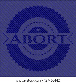 Abortar emblema con fondo jean de alta calidad