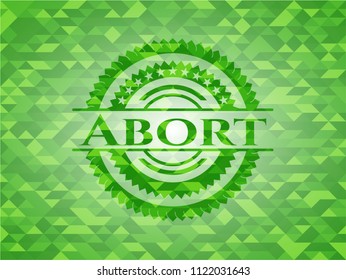 Abort green emblem with mosaic background