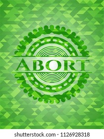 Abort green emblem with mosaic background