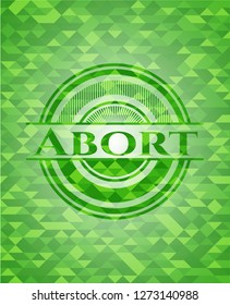 Abort realistic green emblem. Mosaic background
