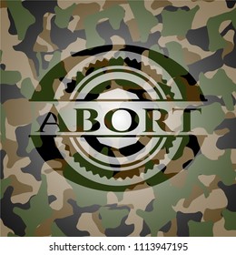  Abort written on a camouflage texture