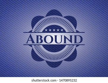 Abound emblem with denim high quality background. Vector Illustration. Detailed.