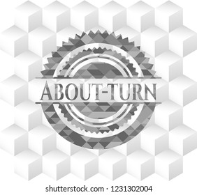About-turn grey emblem with cube white background
