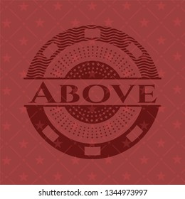 Above red icon or emblem