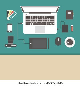 above view workplace  with designer gadget, retro style