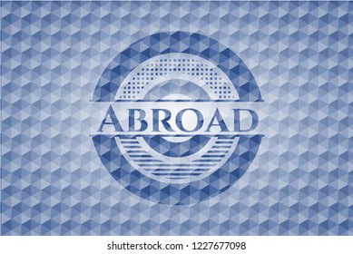Abroad blue badge with geometric pattern background.