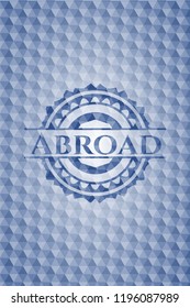 Abroad blue emblem with geometric pattern.