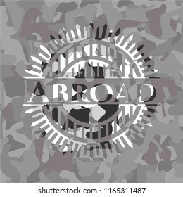 Abroad on grey camouflaged texture