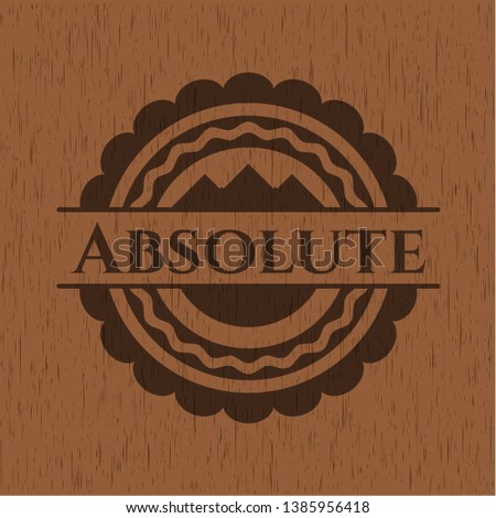 Absolute badge with wood background