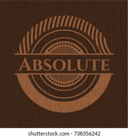 Absolute badge with wooden background