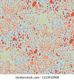 Abstarct graphic seamless pattern of cheetah spots in vibrant colors. African animal skin concept. Vector conceptual design drawn with rough brush